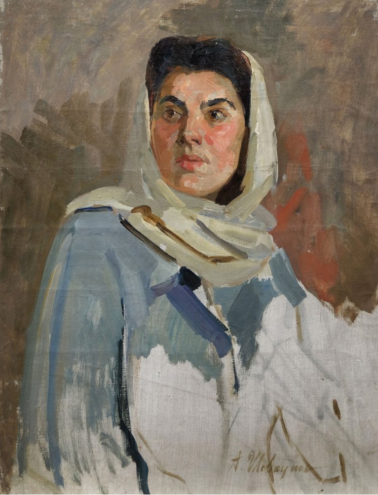 "Portrait of a woman in a headscarf"